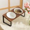 81Kw00FGklL._AC_SL1500 Ceramic Elevated Cat Bowls, Raised Puppy Dishes for Food and Water, Tilted Bamboo Stand for Anti Vomiting, Indoor 5.5 inch Wide Double Dish Orthopedic Anti-Vomiting (Brown)